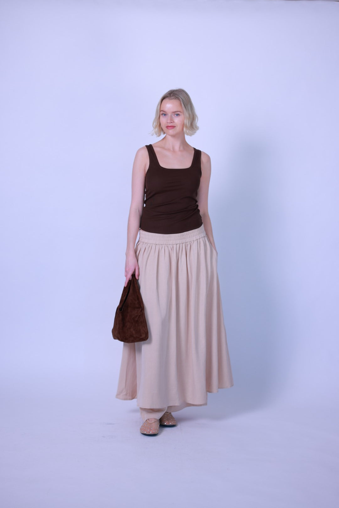 Grand maxi skirt together with long pants