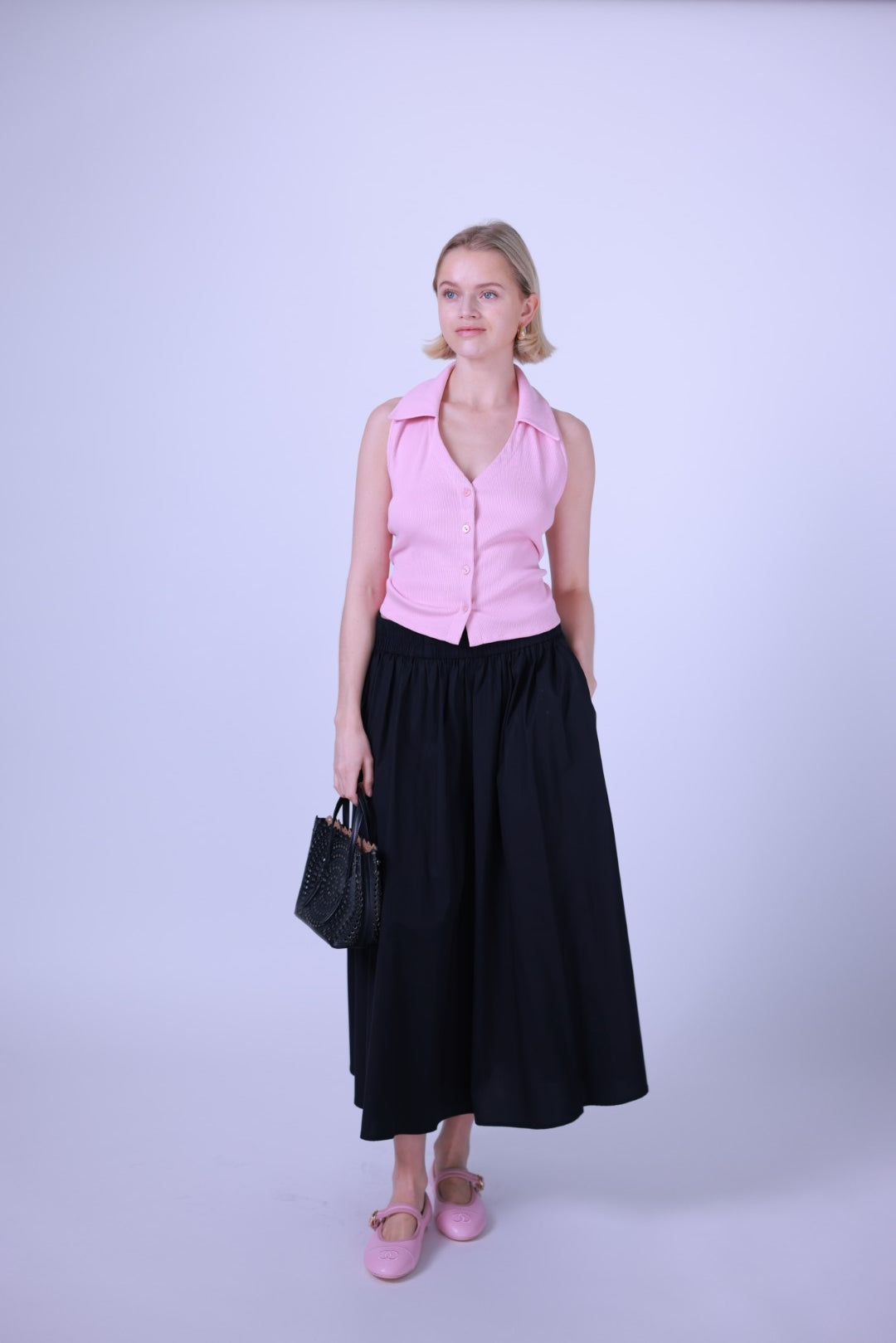 Sleeveless button-up vest