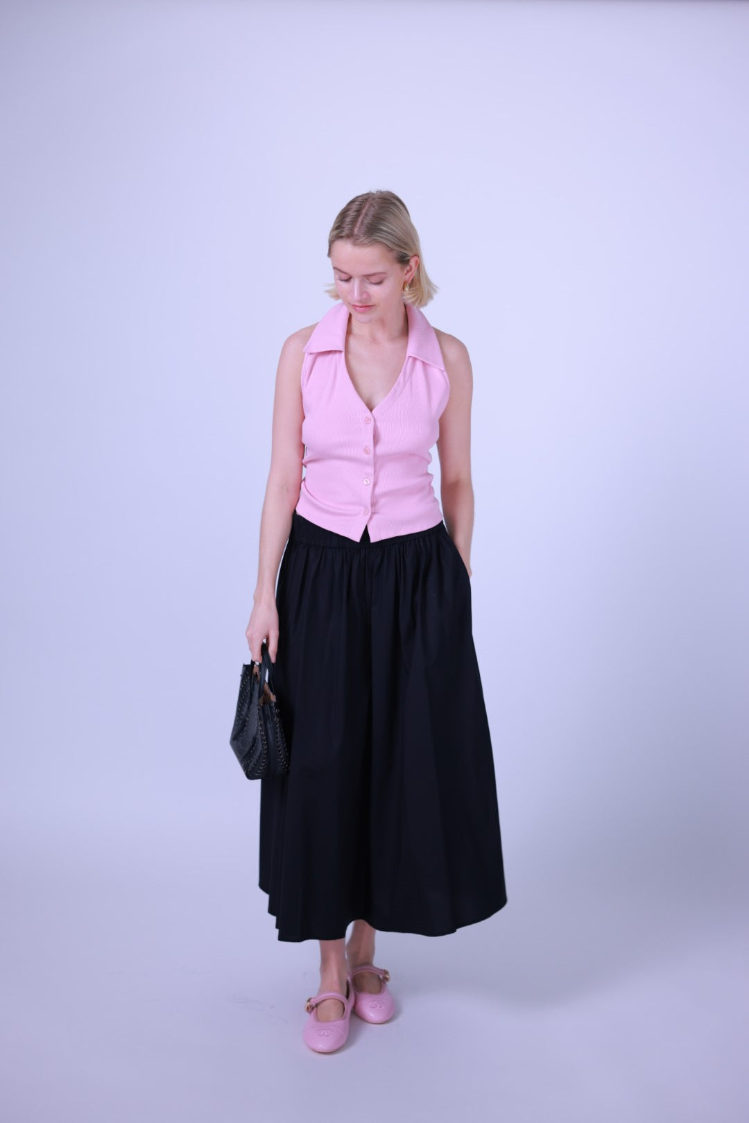 Sleeveless button-up vest